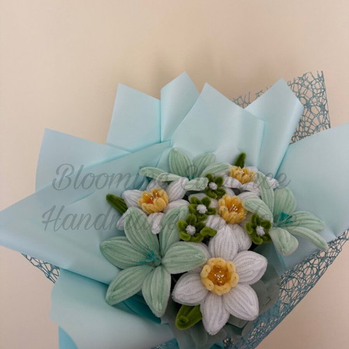 Delicate bouquet of daffodils and lilies custom made in pastel colors
