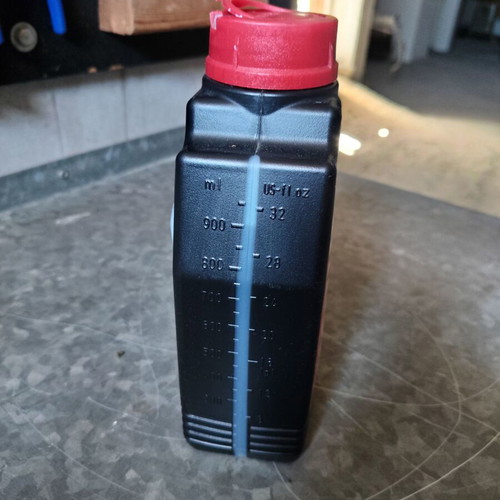 Motul Scooter Expert 2T semi-synthetic oil like new, 900 ml