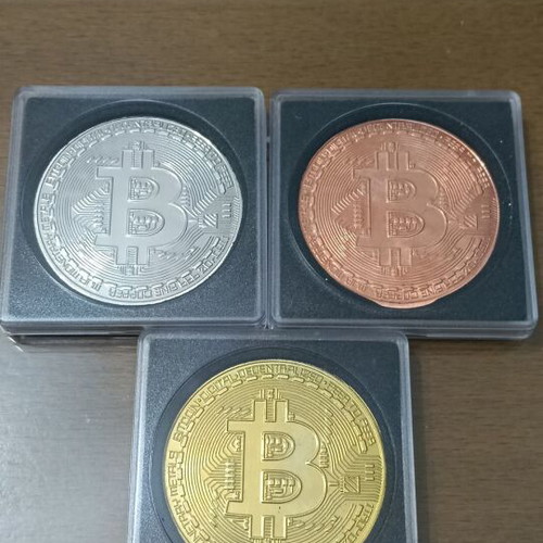 Coins complete uncirculated Bitcoin series in protective capsules, new