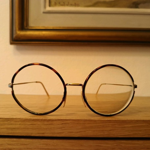 Eyeglasses used, very lightweight, gold color