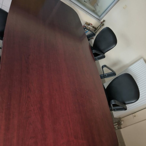 Conference table cherry wood with 6 leather swivel chairs like new