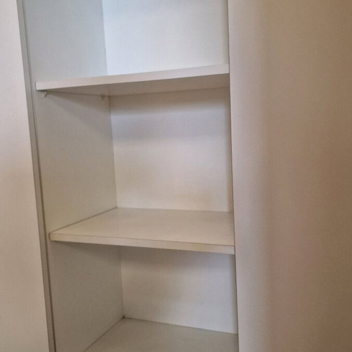 Cabinet with sliding doors and shelves, melamine