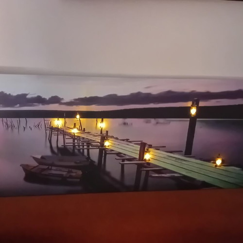 Decorative wall art with LED lighting used, sunset pier design
