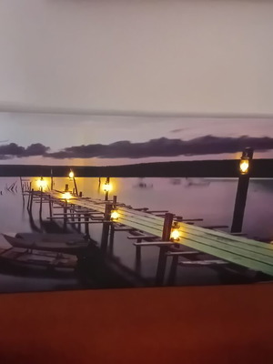 Decorative wall art with LED lighting used, sunset pier design