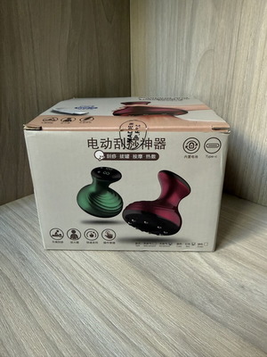 Electric body massage device with cupping and heating