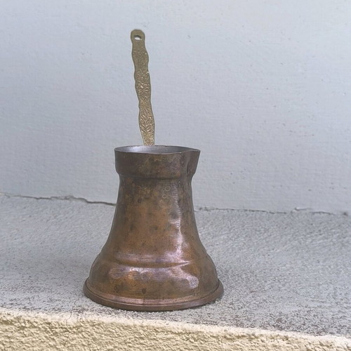 Handmade old copper briki for Greek or Turkish coffee used
