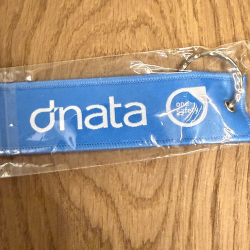 Dnata Remove Before Flight keychain new, blue from Dubai