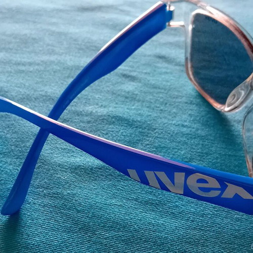 Uvex Kids Sunglasses polarized with blue arms and clear frame like new