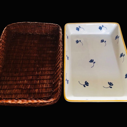 Rectangular Pyrex used with blue flowers and wicker base