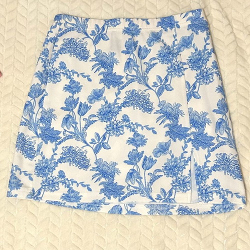 Mini skirt new, white with blue print, size M