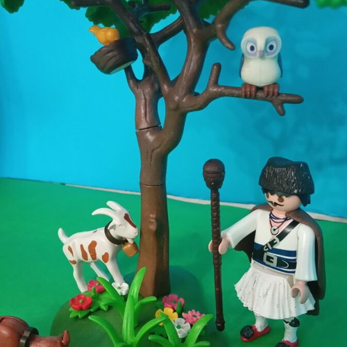 Playmobil shepherd figure with fustanella and diorama