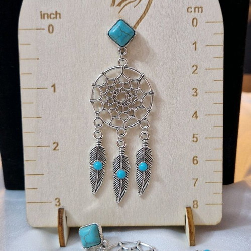 Dreamcatcher earrings new with turquoise stone and silver details