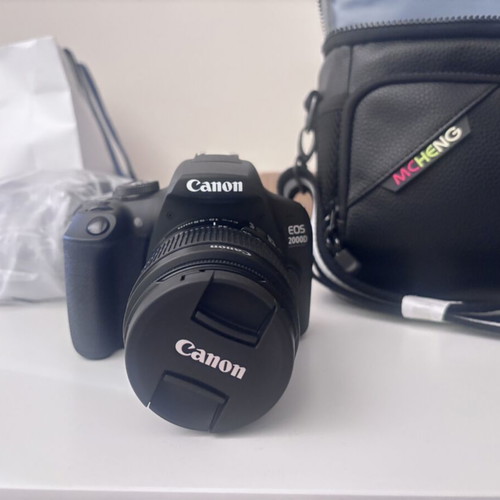 Canon EOS 2000D camera with case and tripod
