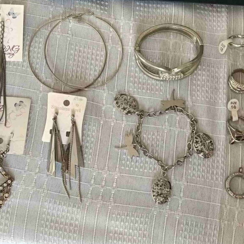 Set of 10 silver-tone jewelry pieces