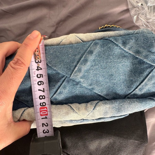 Denim shoulder bag like new with bronze details