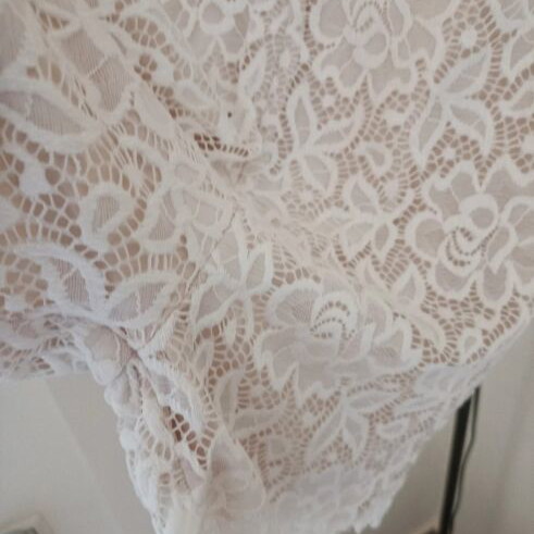 Lace jumpsuit like new, white and beige, with gold clasp