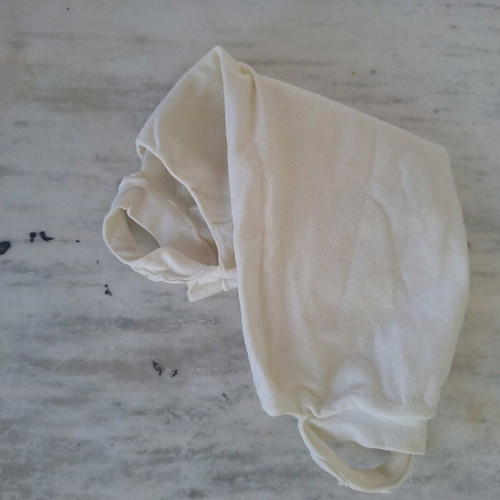 White fabric face mask used with filter pocket