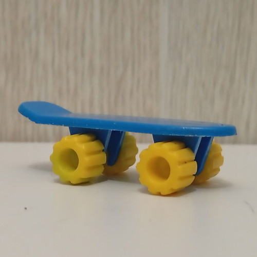 Vintage Algida Lucky Cup blue skateboard toy from the 1980s