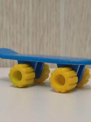 Vintage Algida Lucky Cup blue skateboard toy from the 1980s