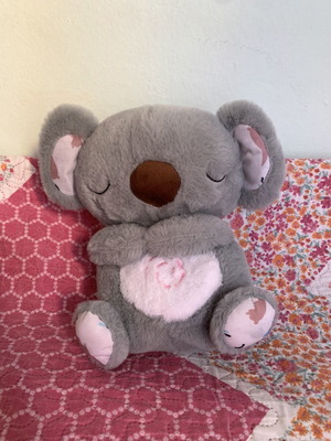 Relaxing plush koala with breathing mechanism