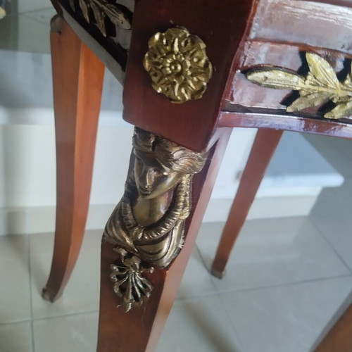 Antique table with marble top and bronze caryatids