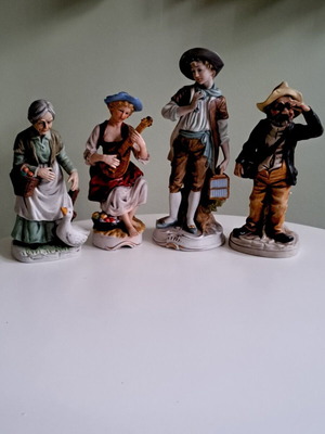 Porcelain figurines set of 4 like new