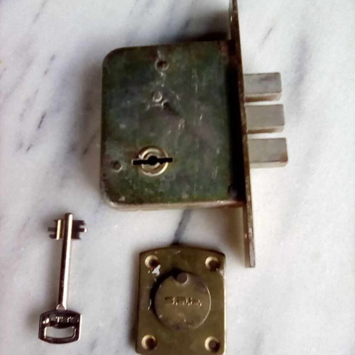 Triaina lock used with one key and metal keyhole cover