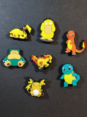 Pokémon Crocs Charms set brand new with Pikachu, Raichu, Ponyta, Snorlax, Charmander, Squirtle