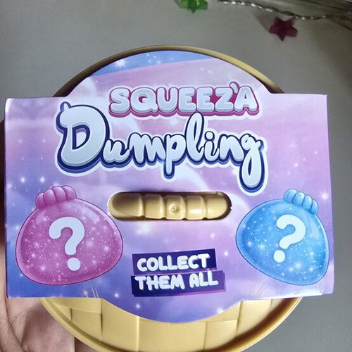 Squeeza Dumpling white squishy toy