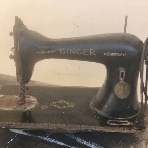Antique sewing machine used with some rust and not working