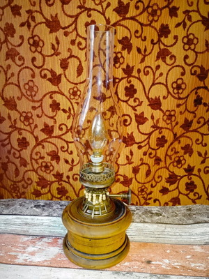 Rustic old lamp with Edison filament bulb used