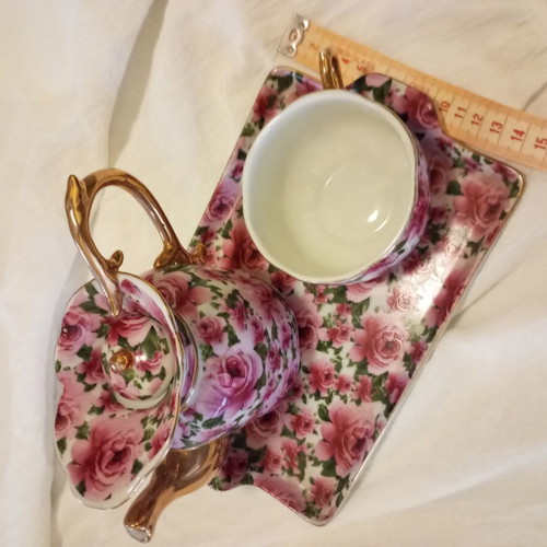 Vintage individual tea set porcelain with gold trim and roses like new