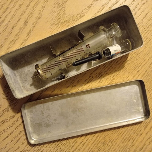 Vintage glass medical syringe used, Italian