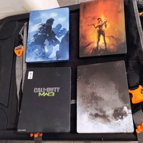 Call of Duty set for Xbox 360 used with 4 steelbooks and accessories