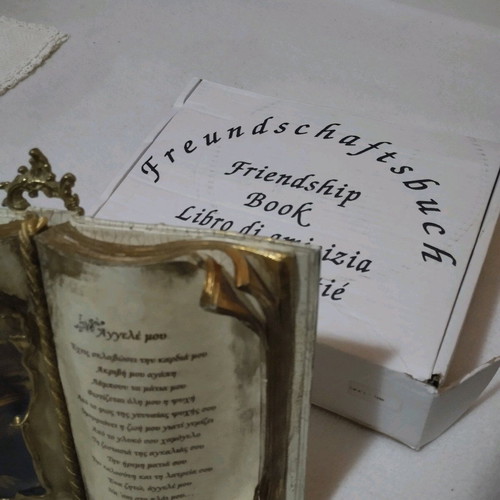 Musical decorative book like new with bronze tripod base