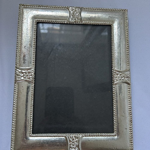 Silver frame with integrated album used, 17x22 cm