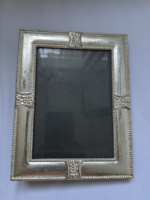 Silver frame with integrated album used, 17x22 cm