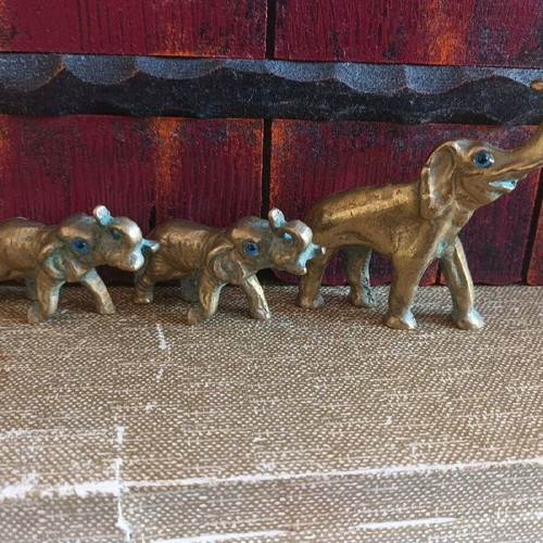 Bronze elephant sculptures like new