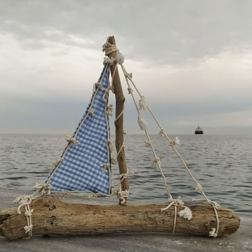 Decorative handmade boat new with driftwood