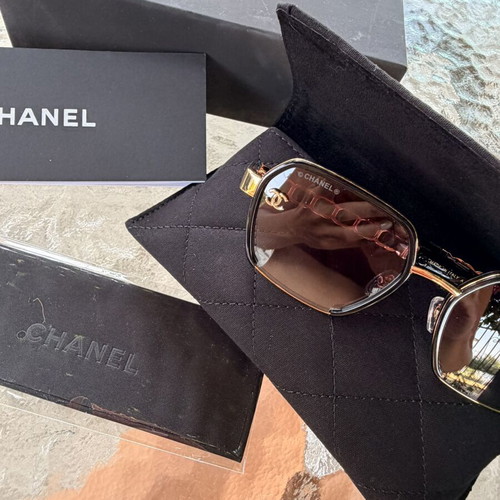 Chanel women's sunglasses black and gold, new model