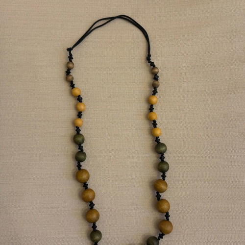 Wooden necklace lightly worn, green and yellow