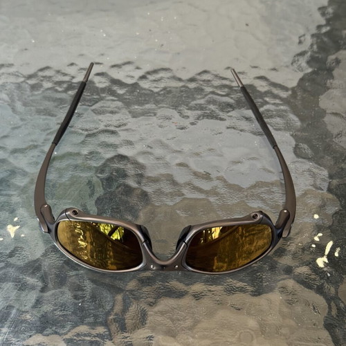 Oakley Juliet X-Metal sunglasses with gold iridium polarized lenses