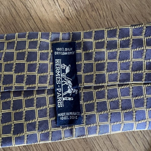 Hermes silk tie like new with geometric basketweave pattern in blue and yellow