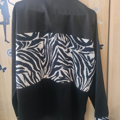Black shirt with animal details like new