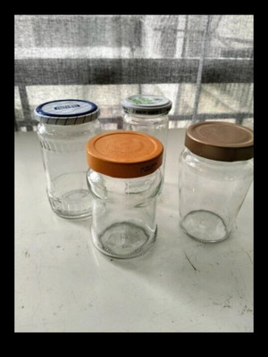 Glass jars like new, set of 4 for kitchen use