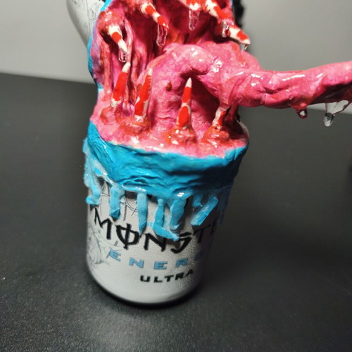 Handmade monster figure from Monster can with clay and UV resin
