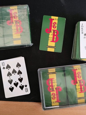 J&B playing cards new, pack of 4 with hard plastic case