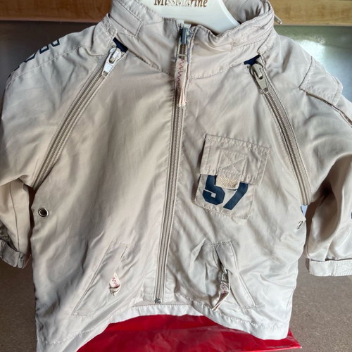 Chevignon baby jacket used with detachable sleeves and hidden hood for 6-month boy
