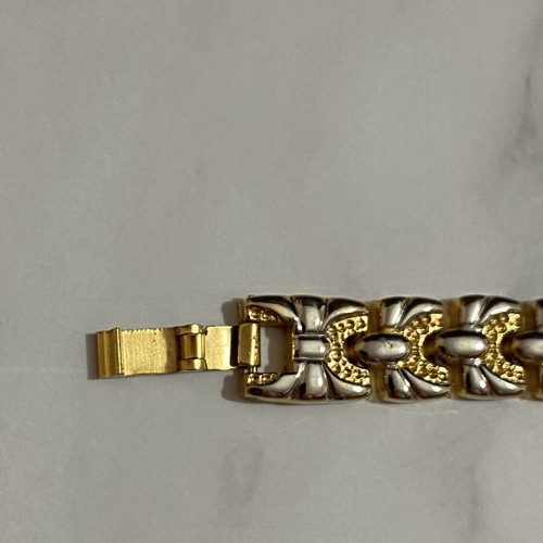 Bracelet in gold and silver colors like new