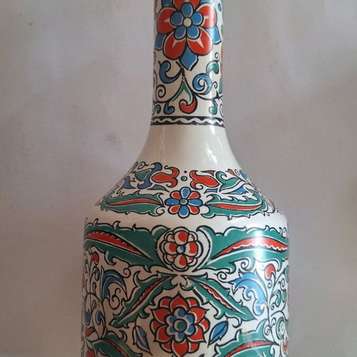 Metaxa carafe/vase used with floral design